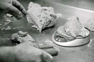Weighing dough black and white